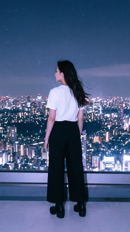 Back view of 90s anime girl oversized T-shirt worn in Tokyo — Akirama aesthetic tee
