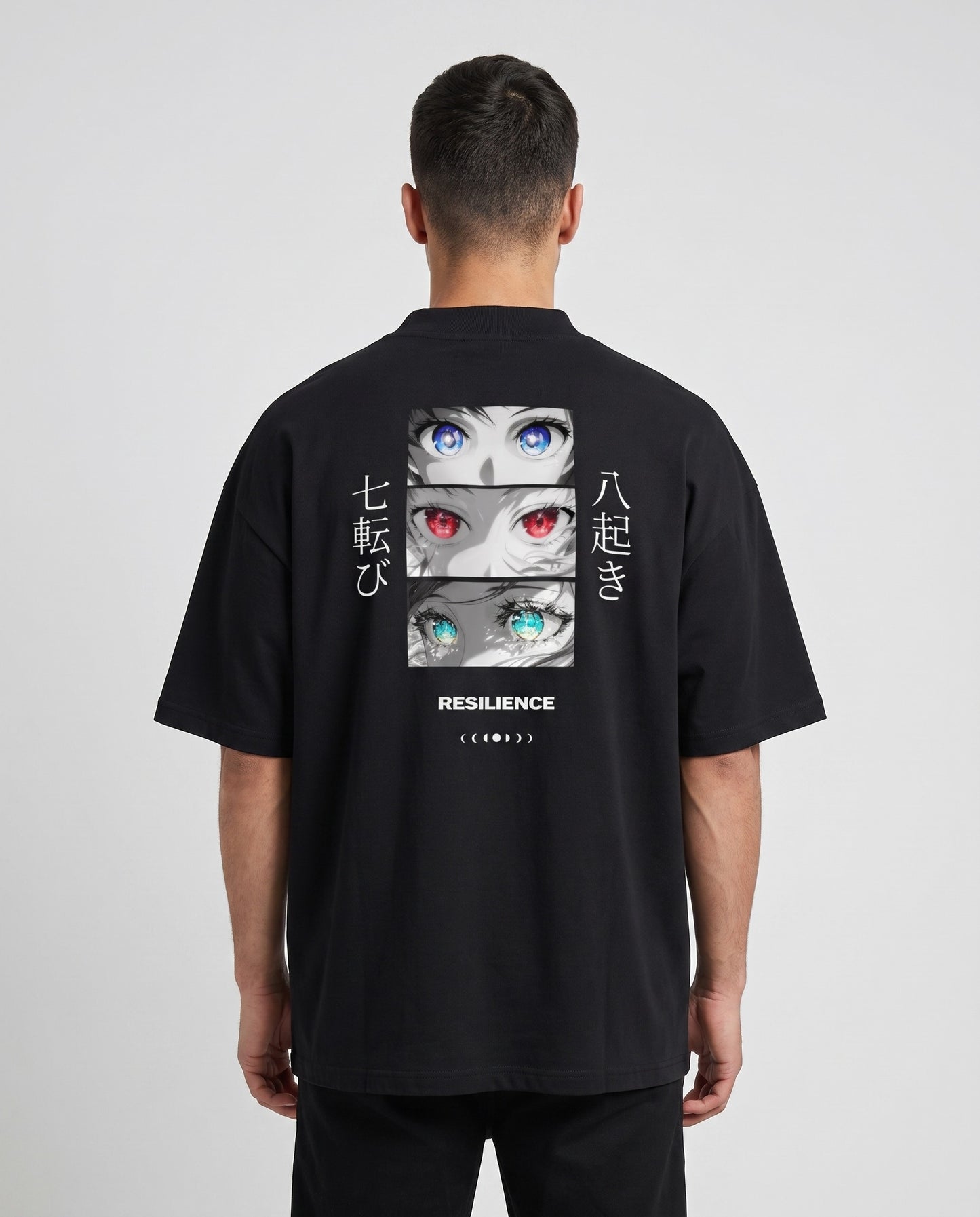 Schwarzes Oversized-T-Shirt mit Anime-Rückenprint: drei Augenpaare, japanische Kanji und Schriftzug Resilience
