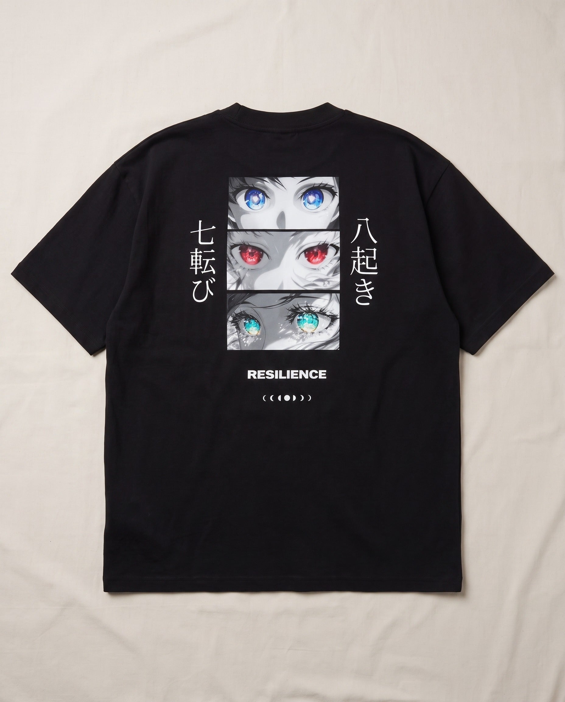 Resilience Oversized T-Shirt Schwarz, Rückseite mit Anime-Augen-Print, Flatlay